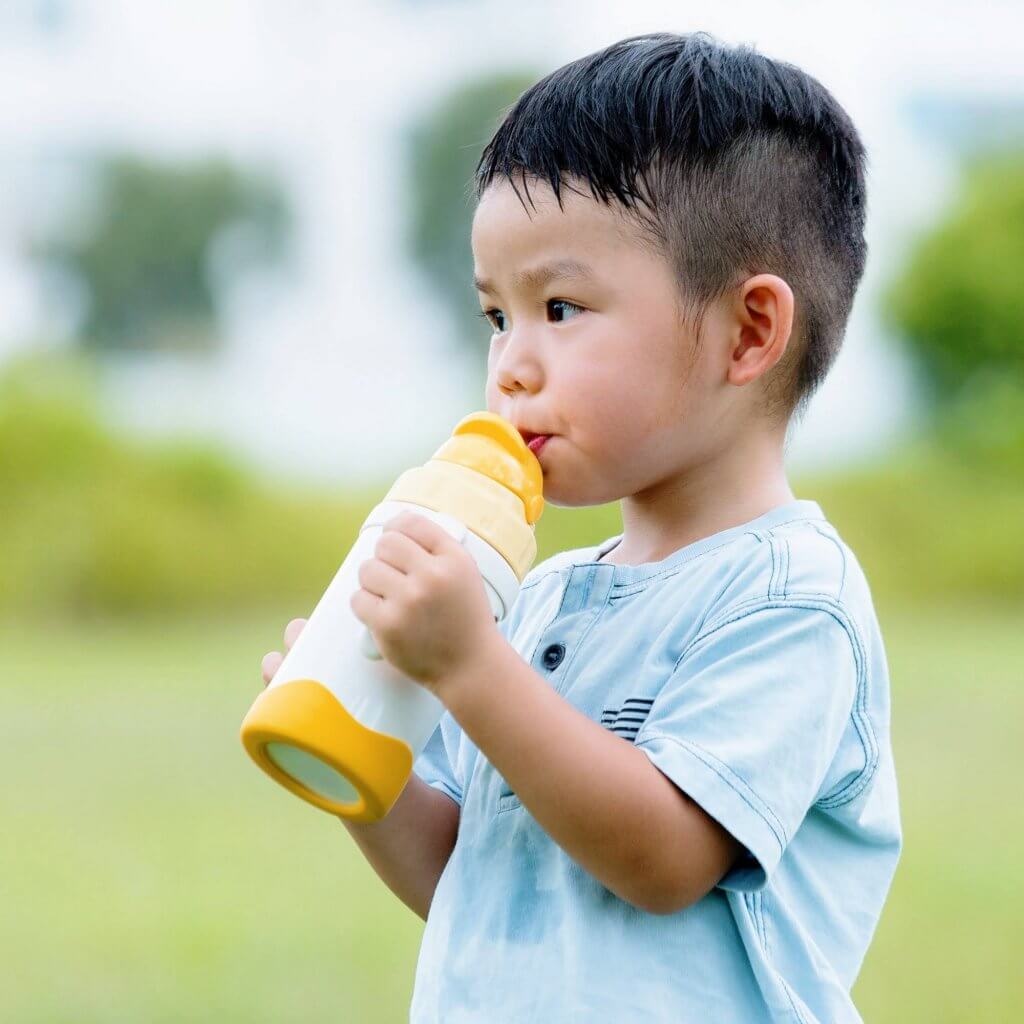 Toddler Drinking Milk Bottle