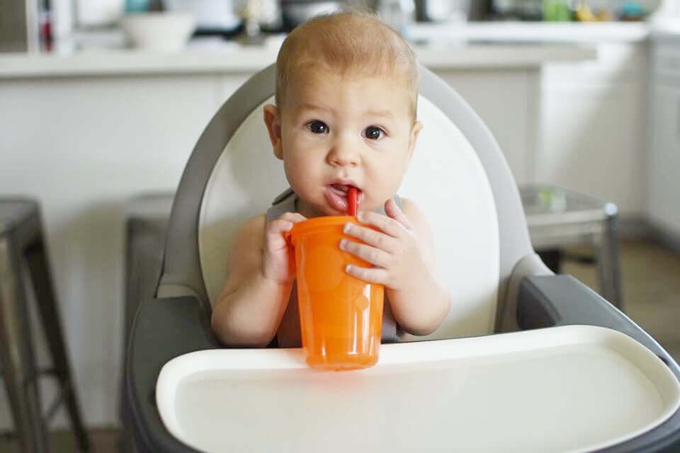 When Should a Toddler Drink from an Open Cup? And other Cup Drinking  Milestones — Ability Innovations